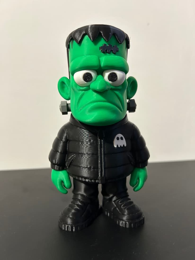 Boneco verde com parafuso